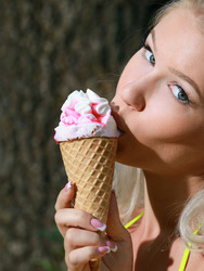 Sexy blonde bombshell Genevieve Gandi licks her ice cream