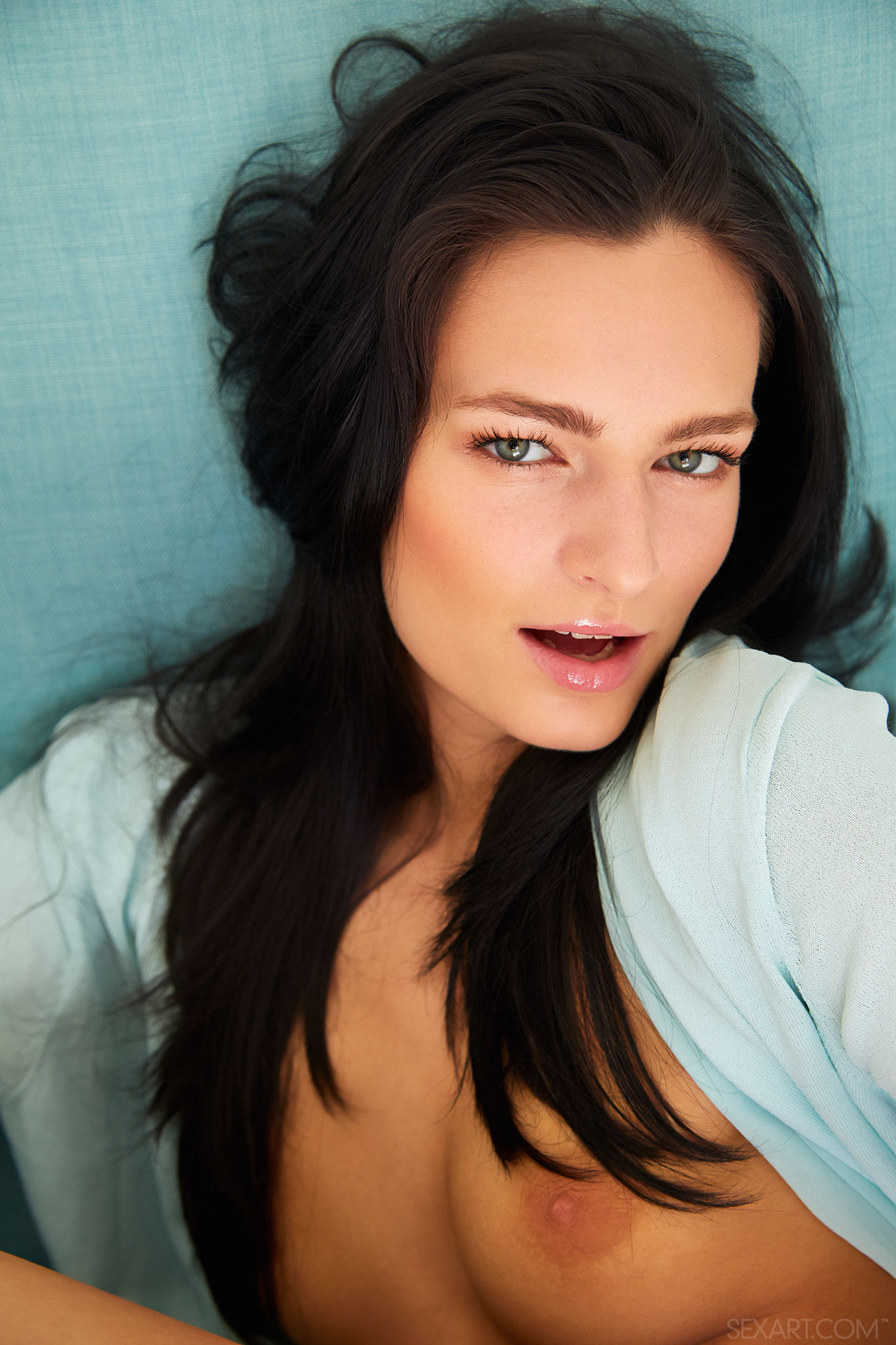 Gorgeous Lee Anne lets her turquoise shirt fall open to reveal her bare, golden-tanned skin 05