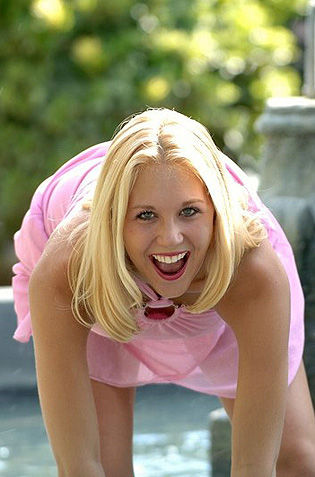 Hot Chick Playing At The Fountain